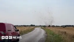 Dust devils filmed lifting tents after hot weather in the East