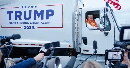 Donald Trump climbs into garbage truck in stunt to call out Biden, Harris - National | Globalnews.ca